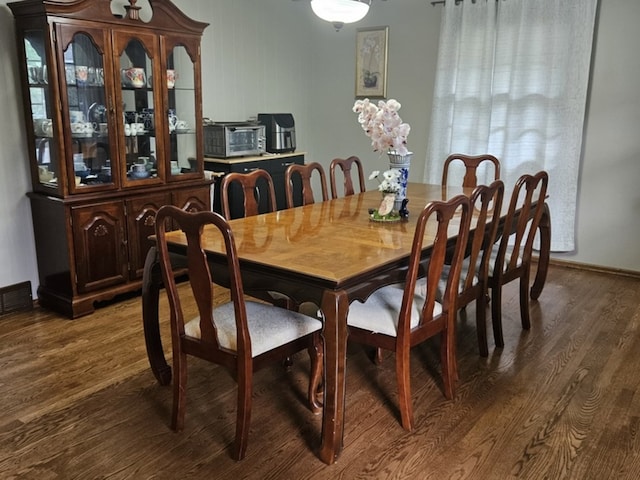 811 N Glenwood Pl, Aurora, IL 60506 - dining area with dark wood-style flooring
