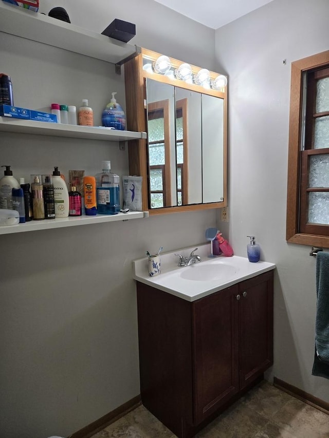 811 N Glenwood Pl, Aurora, IL 60506 - bathroom featuring vanity and baseboards