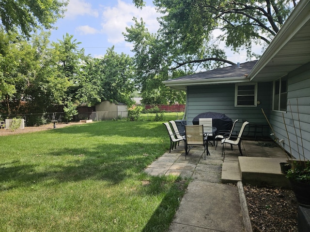 811 N Glenwood Pl, Aurora, IL 60506 - fenced backyard featuring a patio