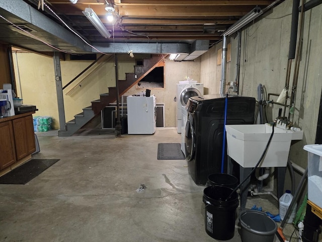 811 N Glenwood Pl, Aurora, IL 60506 - unfinished basement featuring washing machine and dryer and stairway