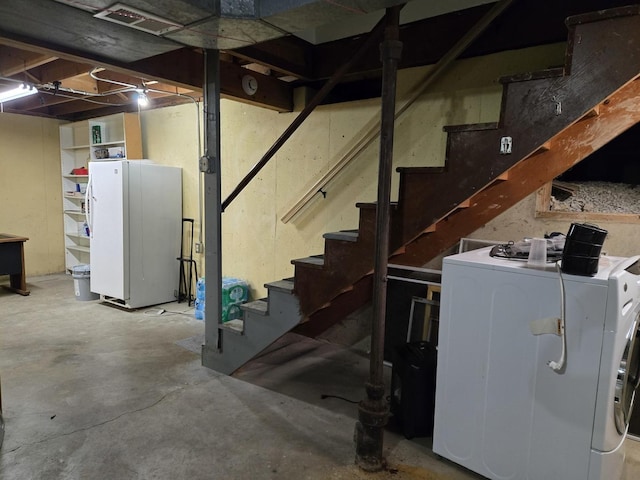 811 N Glenwood Pl, Aurora, IL 60506 - unfinished basement with freestanding refrigerator, stairs, and independent washer and dryer