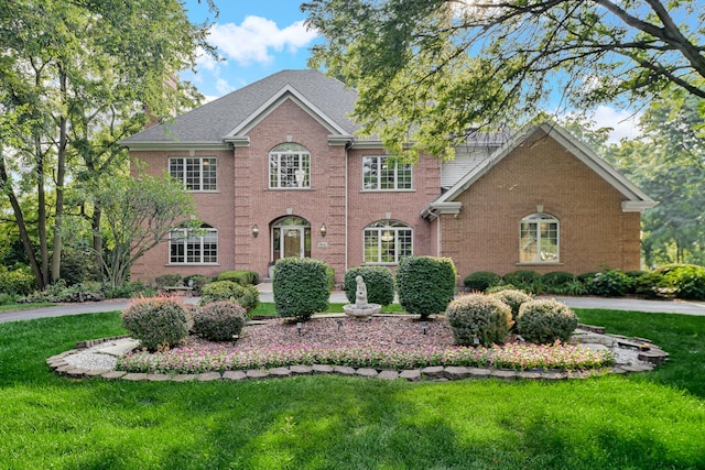 1816 Princeton Rd, Flossmoor, IL 60422 - colonial home featuring brick siding and a front lawn