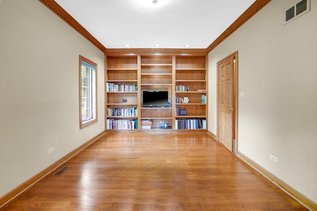 1816 Princeton Rd, Flossmoor, IL 60422 - unfurnished living room with ornamental molding, built in features, wood finished floors, and recessed lighting
