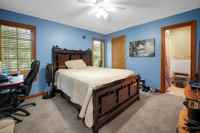 1816 Princeton Rd, Flossmoor, IL 60422 - carpeted bedroom with multiple windows, a desk, connected bathroom, and a ceiling fan
