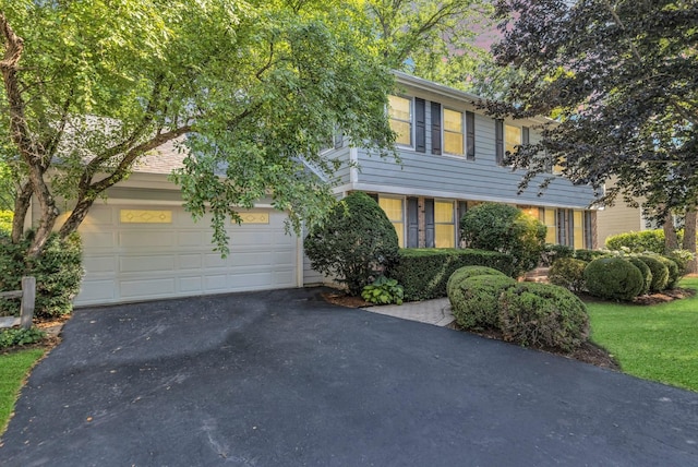 1016 Charleston Dr, Saint Charles, IL 60174 - view of front facade with driveway and an attached garage