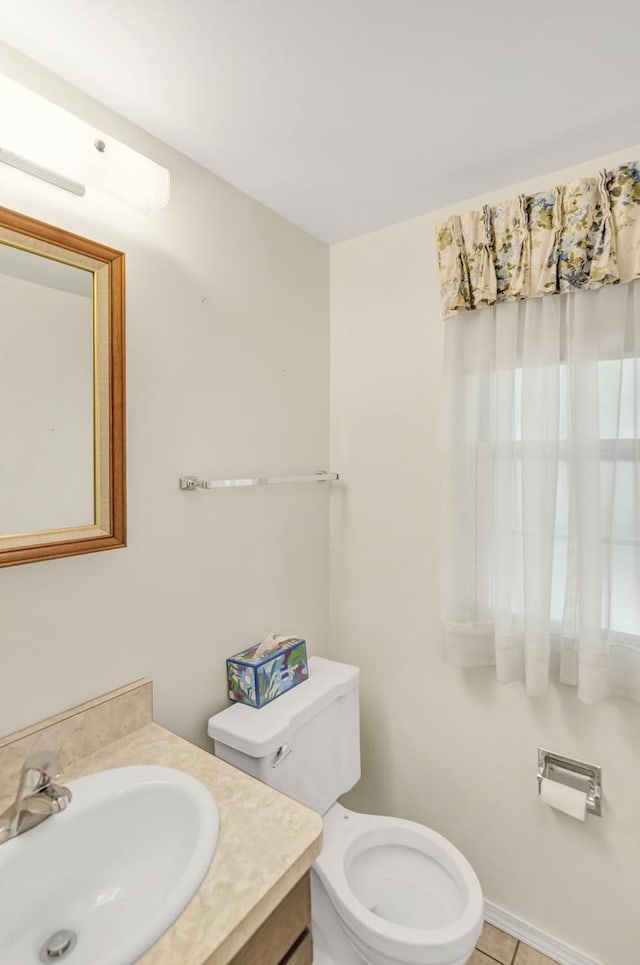 1016 Charleston Dr, Saint Charles, IL 60174 - half bath with vanity and tile patterned flooring