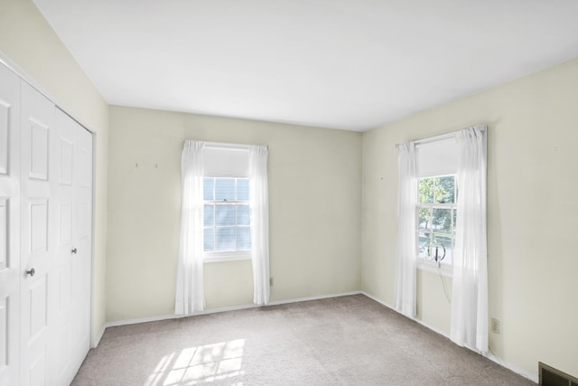 1016 Charleston Dr, Saint Charles, IL 60174 - unfurnished bedroom featuring carpet flooring and baseboards