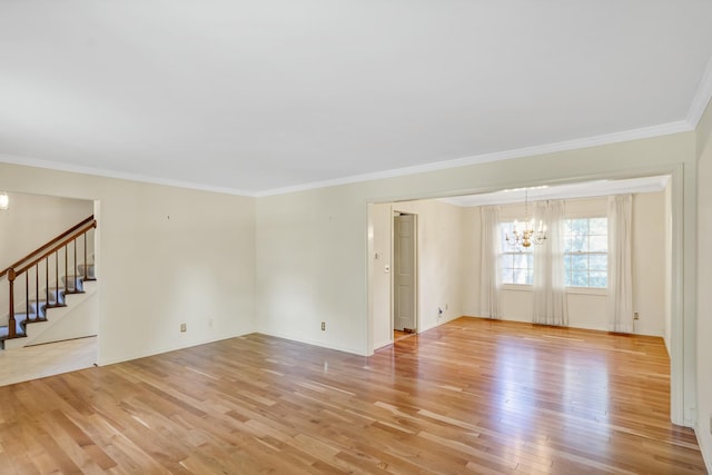 1016 Charleston Dr, Saint Charles, IL 60174 - unfurnished living room featuring a chandelier, light wood finished floors, ornamental molding, and stairs