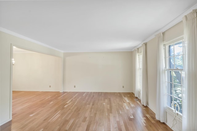 1016 Charleston Dr, Saint Charles, IL 60174 - empty room featuring crown molding and light wood-style floors