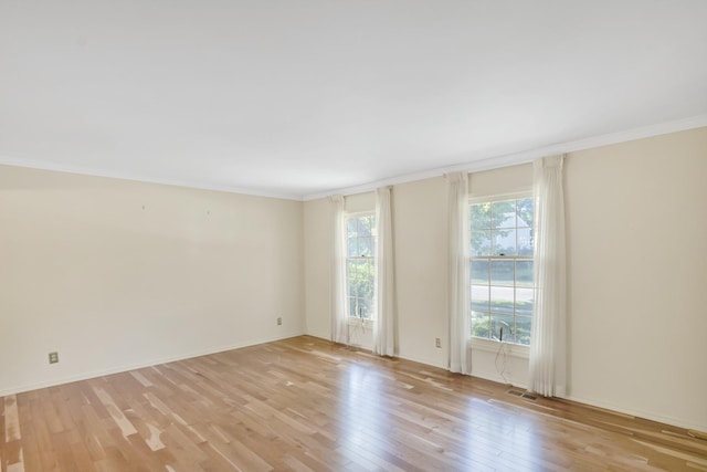 1016 Charleston Dr, Saint Charles, IL 60174 - spare room with light wood-style floors and ornamental molding