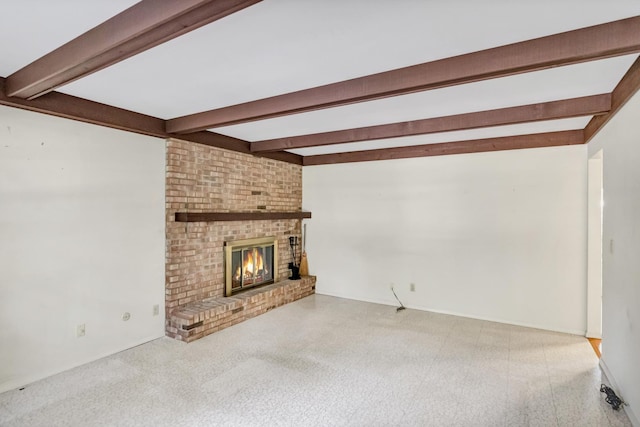 1016 Charleston Dr, Saint Charles, IL 60174 - unfurnished living room with beam ceiling, a fireplace, and carpet