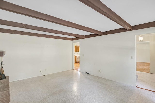 1016 Charleston Dr, Saint Charles, IL 60174 - unfurnished living room featuring beam ceiling