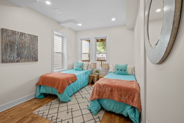 4250 N Whipple St, Chicago, IL 60618 - bedroom featuring wood finished floors and recessed lighting