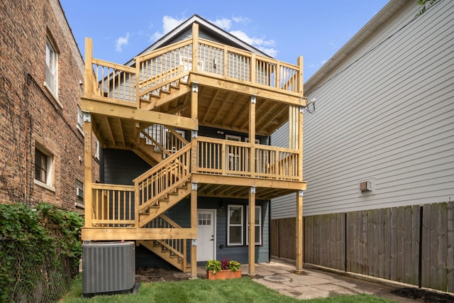 4250 N Whipple St, Chicago, IL 60618 - rear view of property with stairs and a wooden deck