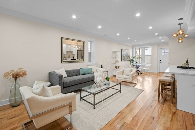 4250 N Whipple St, Chicago, IL 60618 - living area featuring a chandelier, recessed lighting, and light wood finished floors