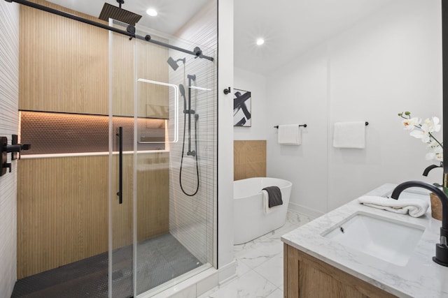 4250 N Whipple St, Chicago, IL 60618 - full bathroom featuring a freestanding bath, a stall shower, marble finish flooring, double vanity, and recessed lighting
