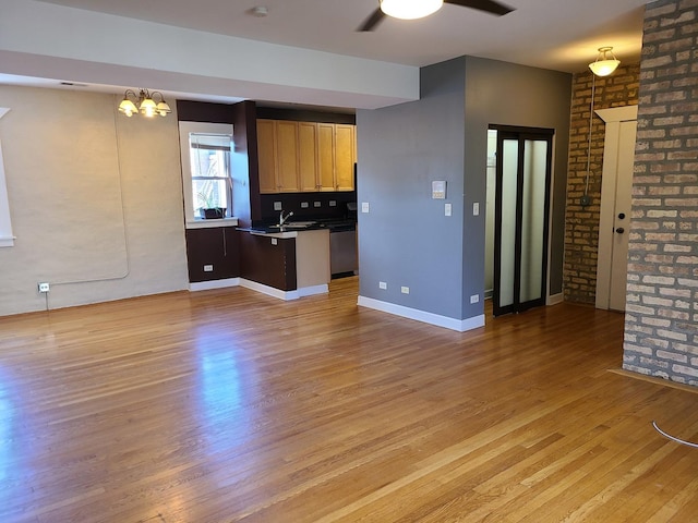 4514 N Ashland Ave Unit B2S, Chicago, IL 60640 - kitchen with dishwasher, ceiling fan, light wood-type flooring, open floor plan, and dark countertops
