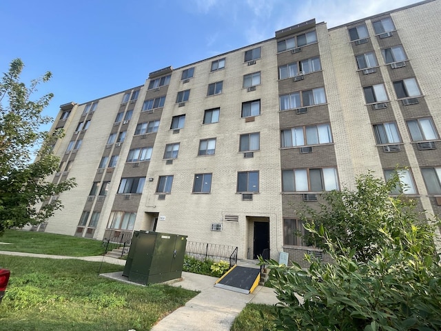 9725 S Karlov Ave Unit 208, Oak Lawn, IL 60453 - view of apartment building / complex featuring uncovered parking