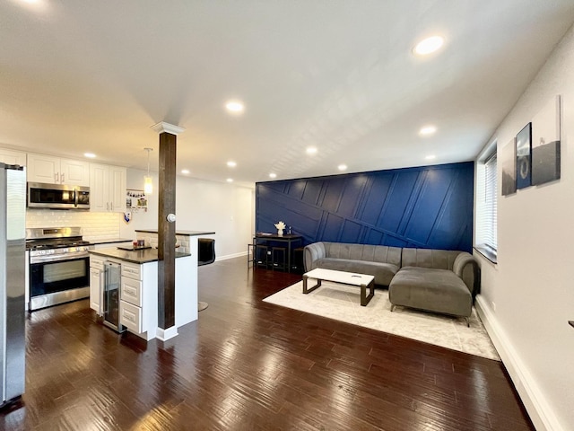 9725 S Karlov Ave Unit 208, Oak Lawn, IL 60453 - living room with beverage cooler, dark wood-style floors, and recessed lighting
