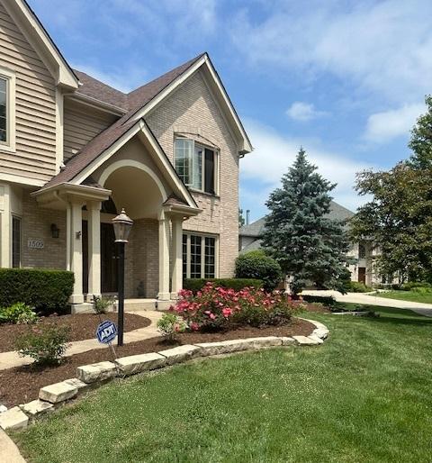 1509 Keim Ct, Saint Charles, IL 60174 - view of front of property with brick siding and a front yard
