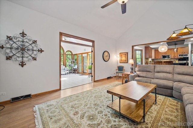 1509 Keim Ct, Saint Charles, IL 60174 - living area with a ceiling fan, light wood-style floors, and high vaulted ceiling