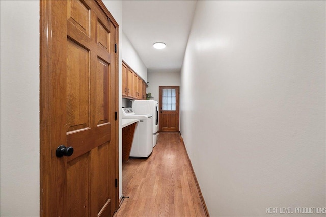 1509 Keim Ct, Saint Charles, IL 60174 - washroom featuring washing machine and dryer, cabinet space, and light wood-style flooring