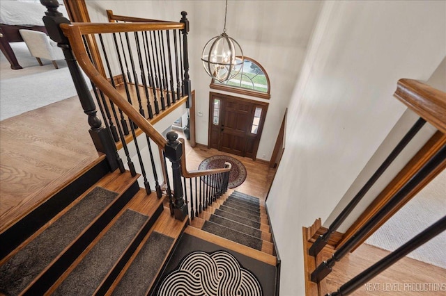 1509 Keim Ct, Saint Charles, IL 60174 - entryway featuring a chandelier, wood finished floors, and stairway