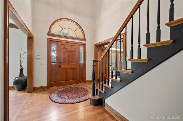 1509 Keim Ct, Saint Charles, IL 60174 - entryway featuring wood finished floors, stairway, and a towering ceiling