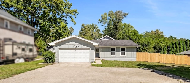 160 E Terra Cotta Ave, Crystal Lake, IL 60014 - view of front of home with board and batten siding, an attached garage, and driveway