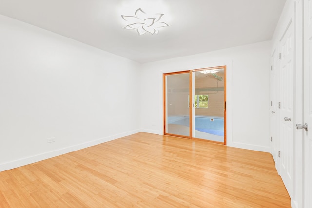 160 E Terra Cotta Ave, Crystal Lake, IL 60014 - unfurnished bedroom with light wood finished floors and baseboards