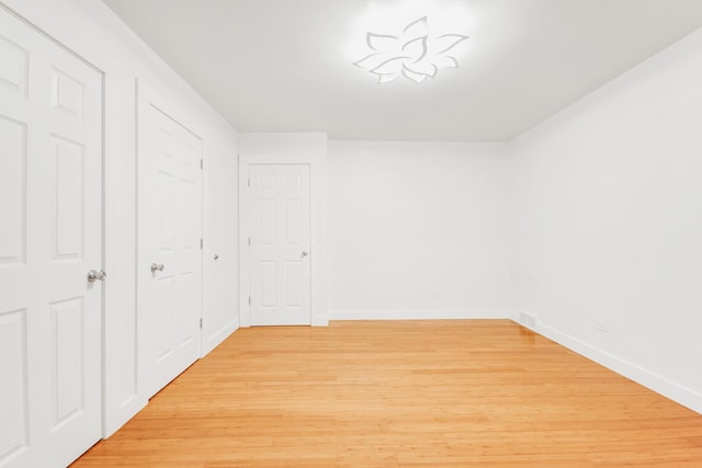 160 E Terra Cotta Ave, Crystal Lake, IL 60014 - unfurnished bedroom featuring light wood-type flooring