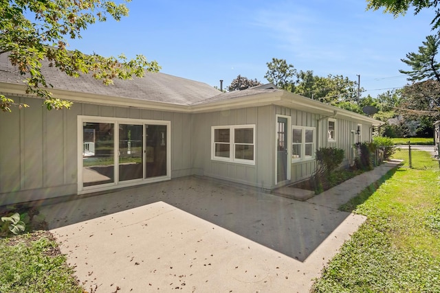 160 E Terra Cotta Ave, Crystal Lake, IL 60014 - rear view of property featuring board and batten siding and a patio area