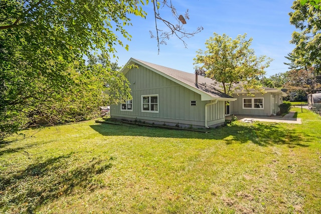 160 E Terra Cotta Ave, Crystal Lake, IL 60014 - view of side of home featuring a lawn and a patio area
