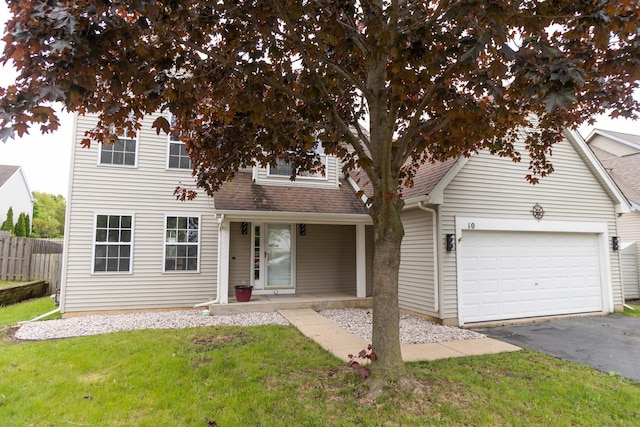 10 Sugar Creek Ct, Lake In The Hills, IL 60156 - view of front of house with driveway, an attached garage, a shingled roof, and a porch