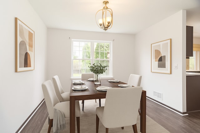 10 Sugar Creek Ct, Lake In The Hills, IL 60156 - dining area featuring wood finished floors and a chandelier
