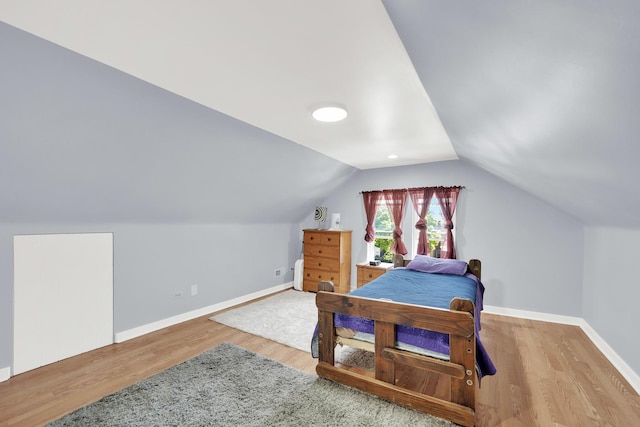 3826 S Honore St, Chicago, IL 60609 - bedroom with wood finished floors and vaulted ceiling