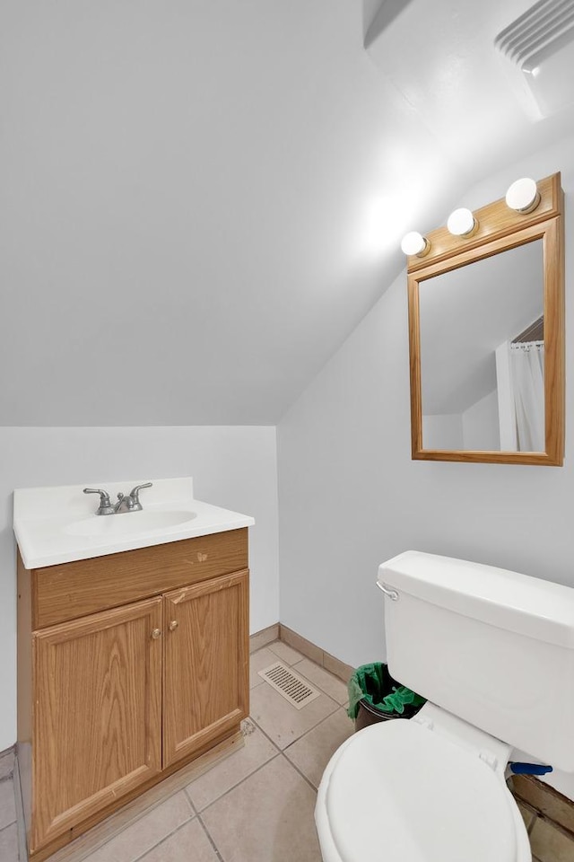 3826 S Honore St, Chicago, IL 60609 - full bathroom with vanity, lofted ceiling, and tile patterned flooring