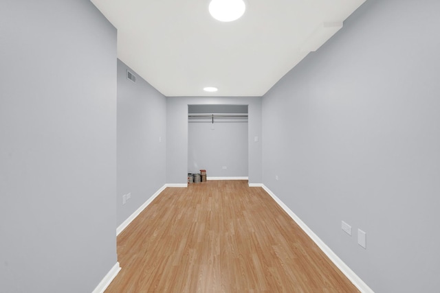3826 S Honore St, Chicago, IL 60609 - empty room with light wood-type flooring and baseboards