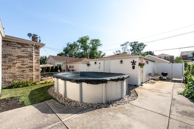 3345 N Page Ave, Chicago, IL 60634 - view of patio featuring an outdoor structure