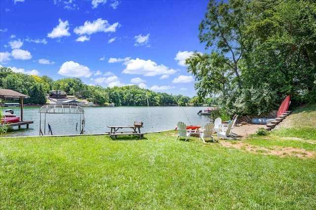6 Barbados Ct N, Putnam, IL 61560 - view of green lawn featuring a dock, a water view, and boat lift