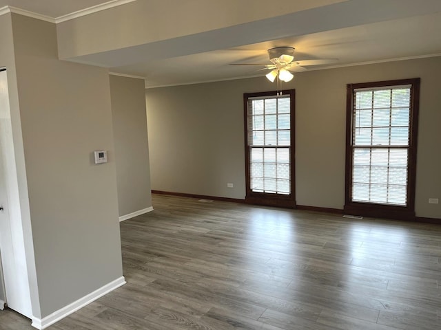 19708 S Skye Dr, Frankfort, IL 60423 - unfurnished room featuring crown molding, healthy amount of natural light, a ceiling fan, and wood finished floors