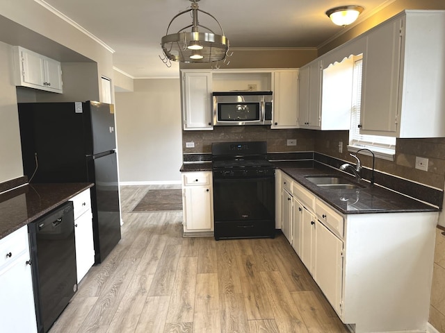 19708 S Skye Dr, Frankfort, IL 60423 - kitchen with black appliances, crown molding, light wood-style floors, decorative backsplash, and white cabinets