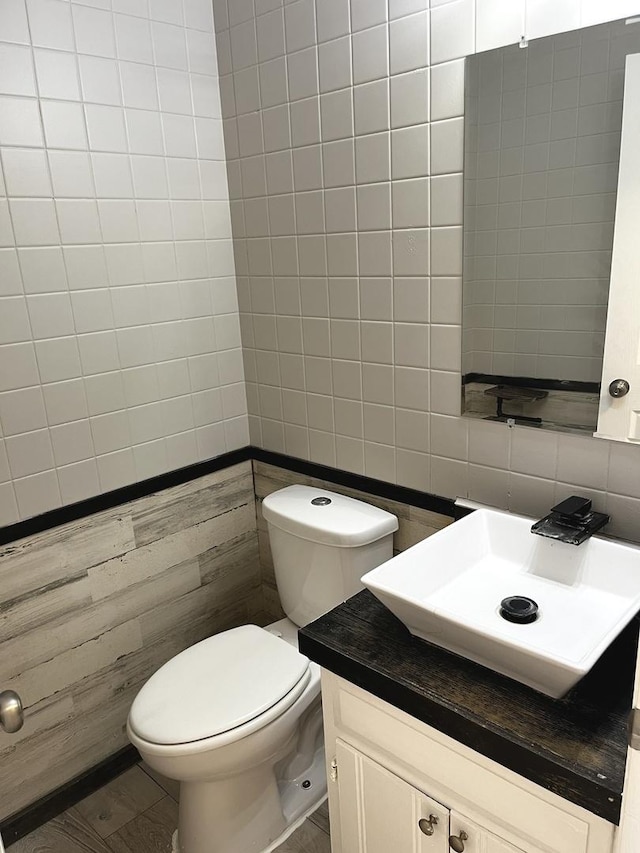 19708 S Skye Dr, Frankfort, IL 60423 - half bathroom featuring tile walls, vanity, and decorative backsplash