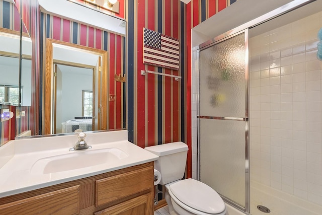 7672 Thistlewood Ln, Frankfort, IL 60423 - ensuite bathroom featuring wallpapered walls, a stall shower, vanity, and healthy amount of natural light