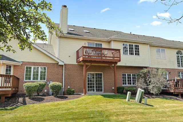 7672 Thistlewood Ln, Frankfort, IL 60423 - back of house featuring a wooden deck, a lawn, a chimney, and brick siding