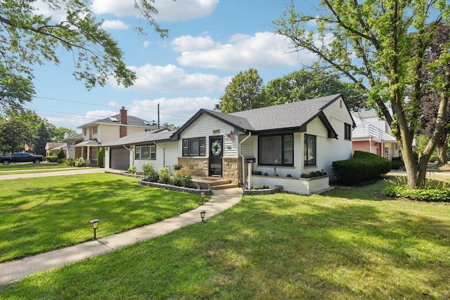 1610 S Greenwood Ave, Park Ridge, IL 60068 - view of front facade featuring an attached garage, concrete driveway, and a front yard