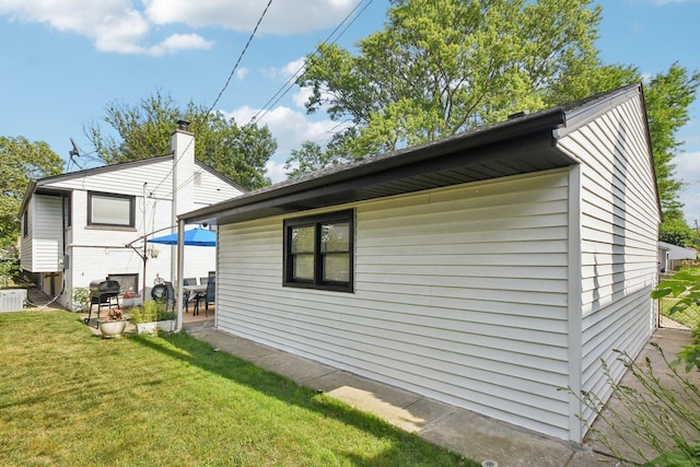 1610 S Greenwood Ave, Park Ridge, IL 60068 - view of home's exterior featuring a yard and a patio area