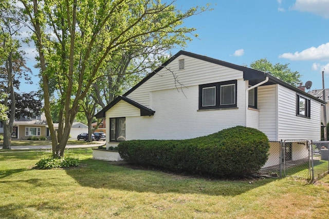 1610 S Greenwood Ave, Park Ridge, IL 60068 - view of side of property with brick siding and a gate