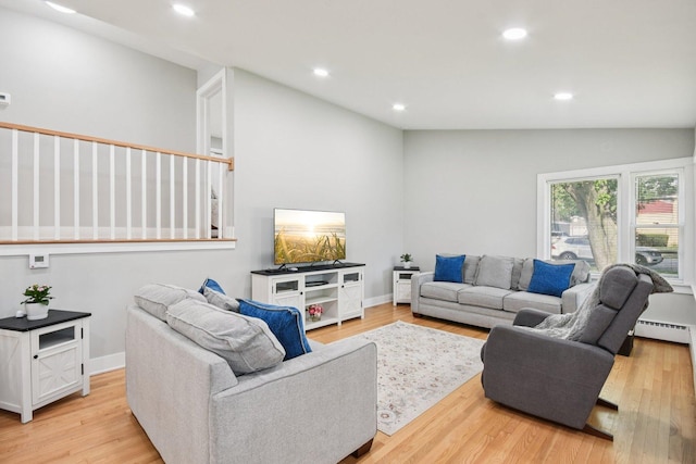 1610 S Greenwood Ave, Park Ridge, IL 60068 - living room with recessed lighting, light wood finished floors, vaulted ceiling, and a baseboard heating unit