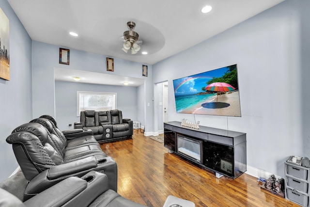 7627 S Prairie Ave, Chicago, IL 60619 - living room featuring ceiling fan, wood finished floors, and recessed lighting
